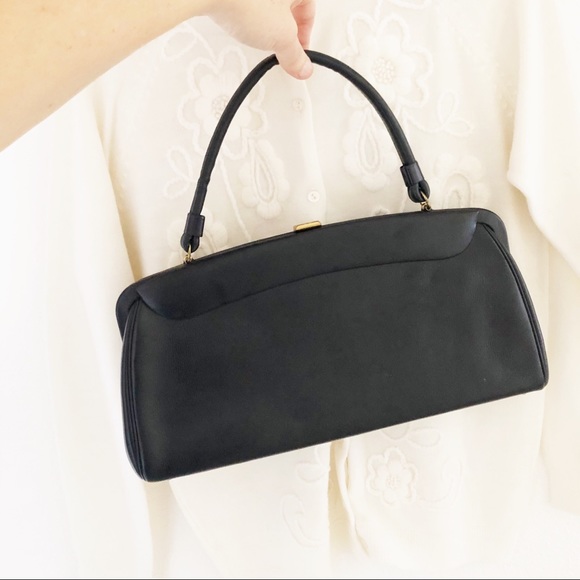 small navy blue clutch bag